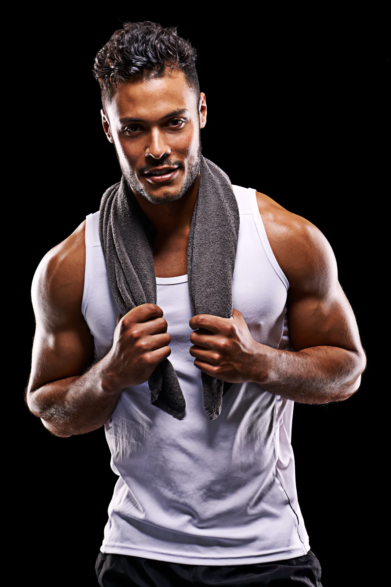 fit young man with towel draped around neck utc